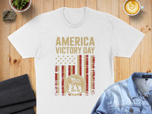 Load image into Gallery viewer, White t-shirt with "America Victory Day May 08" patriotic graphic.
