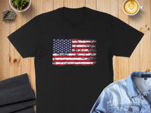 Load image into Gallery viewer, Black t-shirt with distressed American flag graphic.
