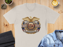 Load image into Gallery viewer, Cream t-shirt with 250th Anniversary eagle emblem, 1776-2026.

