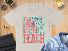 Load image into Gallery viewer, T-shirt with text "It's a good day to teach" and a pencil illustration.
