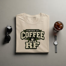 Load image into Gallery viewer, Cream t-shirt with "Powered by Coffee and RF" text and coffee cup graphic.
