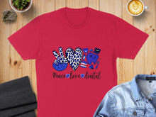 Load image into Gallery viewer, Red t-shirt with "Peace Love Dental" text and leopard print heart graphic.
