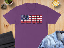 Load image into Gallery viewer, Purple t-shirt with "BRUH" text made of American flag pattern.
