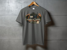 Load image into Gallery viewer, T-shirt graphic with vintage radio equipment, measuring tools, and text "MEASURE TWICE TUNE ONCE".
