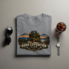 Load image into Gallery viewer, Gray t-shirt with "Radio Expedition Club" graphic featuring camping and radio equipment.
