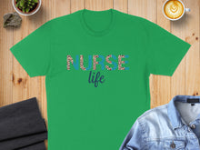 Load image into Gallery viewer, Green t-shirt with "Nurse Life" graphic in leopard print and blue letters.
