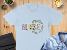 Load image into Gallery viewer, Light blue t-shirt with "Nurse protector warrior hero" text design.

