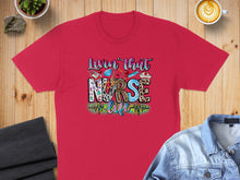 Load image into Gallery viewer, Red t-shirt with "Livin' that Nurse Life" text and medical icons.
