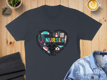 Load image into Gallery viewer, Heart graphic with medical items and "Nurse" text, on a dark t-shirt.

