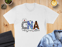 Load image into Gallery viewer, White t-shirt with "CNA certified nursing assistant" in colorful, spooky Halloween-themed lettering.
