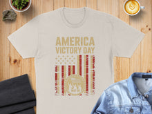 Load image into Gallery viewer, Cream t-shirt with "America Victory Day May 08" text and US flag design.

