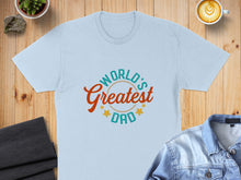 Load image into Gallery viewer, Light blue t-shirt with "World's Greatest Dad" in orange and green text.
