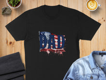 Load image into Gallery viewer, Black t-shirt with "Dad The Man The Myth The Legend" text and American flag design.
