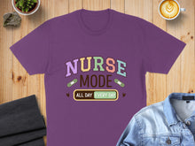 Load image into Gallery viewer, Purple t-shirt with "Nurse Mode All Day Every Day" text and bandages.
