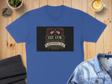 Load image into Gallery viewer, Blue t-shirt with "Est. 1776 Independence Day" American flag graphic.
