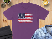 Load image into Gallery viewer, Purple t-shirt with distressed American flag graphic.
