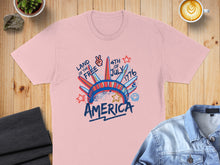 Load image into Gallery viewer, Pink t-shirt with "Land of the Free 4th of July America" graphic.
