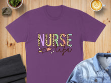 Load image into Gallery viewer, Purple t-shirt with "Nurse life" text and syringe graphic.
