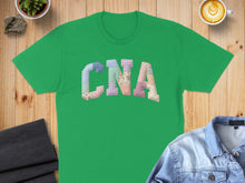 Load image into Gallery viewer, Green t-shirt with patchwork letters spelling "CNA".
