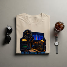 Load image into Gallery viewer, T-shirt with a radio operator's setup illustration, including radio, microphone, and clock.
