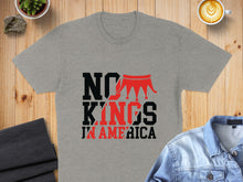 Load image into Gallery viewer, Gray t-shirt with "NO KINGS IN AMERICA" text and a red crown design.
