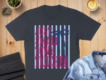 Load image into Gallery viewer, Dark grey t-shirt with "Just a Small Town Teacher" text and blue bow graphic.
