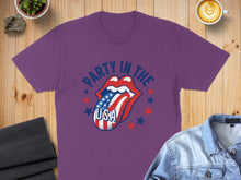 Load image into Gallery viewer, Purple t-shirt with patriotic tongue and "Party in the USA" text.
