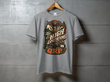 Load image into Gallery viewer, Gray t-shirt with "Low Power High Expectations QRP" graphic featuring radio equipment and nature.
