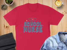 Load image into Gallery viewer, Red t-shirt with "SCHOOL NURSE" text and a small pill icon.
