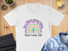Load image into Gallery viewer, White t-shirt with "This is What an Awesome Pediatric Nurse Looks Like" text and rainbow stethoscope.
