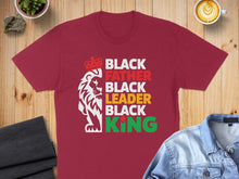 Load image into Gallery viewer, Maroon t-shirt with "BLACK FATHER BLACK LEADER BLACK KING" text and a lion silhouette.
