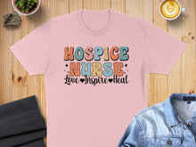 Load image into Gallery viewer, Pink t-shirt with "Hospice Nurse Love Inspire Heal" text.
