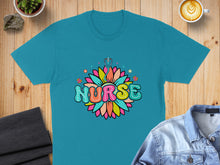 Load image into Gallery viewer, Teal t-shirt with colorful "NURSE" text inside a flower design.
