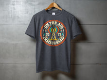 Load image into Gallery viewer, Dark gray t-shirt with a circular "On The Air Amateur Radio" graphic.
