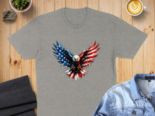 Load image into Gallery viewer, Grey t-shirt with a distressed American flag eagle graphic.
