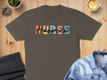 Load image into Gallery viewer, Brown t-shirt with the word "Nurse" in colorful retro lettering.

