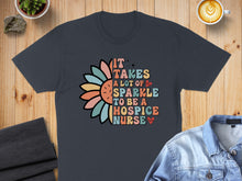 Load image into Gallery viewer, Dark t-shirt with colorful flower graphic and text: "It takes a lot of love to be a hospice nurse."
