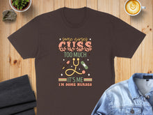 Load image into Gallery viewer, Brown t-shirt with "Some Nurses Cuss Too Much, It's Me, I'm Some Nurses" graphic.

