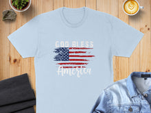 Load image into Gallery viewer, Light blue t-shirt with distressed American flag graphic and "God Bless America" text.
