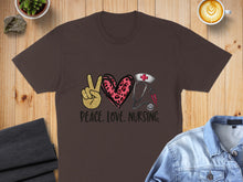 Load image into Gallery viewer, Brown t-shirt with "Peace. Love. Nursing." text, peace sign, heart, and stethoscope.
