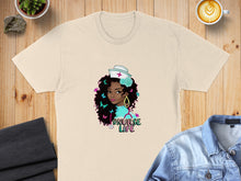 Load image into Gallery viewer, Nurse graphic with "#NURSELIFE" text, on a cream t-shirt.
