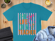 Load image into Gallery viewer, Teal t-shirt with "The Life of a Teacher" in colorful stripes and a ribbon.
