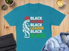 Load image into Gallery viewer, Teal t-shirt with Black Father, Black Leader, Black King text and lion graphic.
