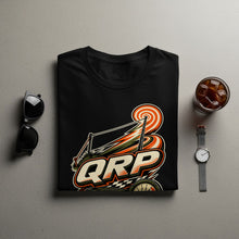 Load image into Gallery viewer, Black t-shirt with a colorful "QRP" graphic featuring a target and race elements.
