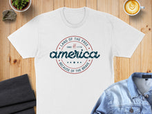 Load image into Gallery viewer, White t-shirt with "Land of the Free Because of the Brave Since 1776" text.
