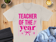 Load image into Gallery viewer, Cream t-shirt with "Teacher of the Year" text in pink.
