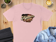 Load image into Gallery viewer, Pink t-shirt with distressed "America" graphic featuring US flag elements.
