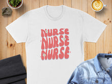 Load image into Gallery viewer, White t-shirt with "Nurse Nurse Nurse" in pink wavy text and small flowers.
