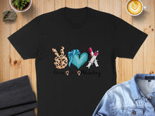 Load image into Gallery viewer, Black t-shirt with peace sign, heart, and syringes graphic and text.

