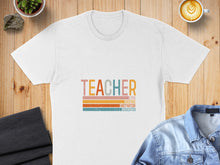 Load image into Gallery viewer, White t-shirt with "TEACHER" in colorful retro font above "LOVE INSPIRE MOTIVATOR EDUCATOR".
